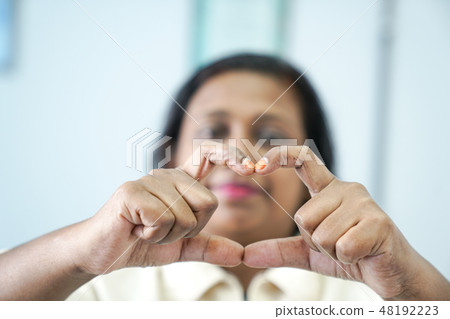 Hand gestures making a love sign Hand gestures making a love sign 48192223