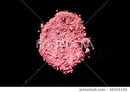 Pink color dust particles splattered on black 48193189