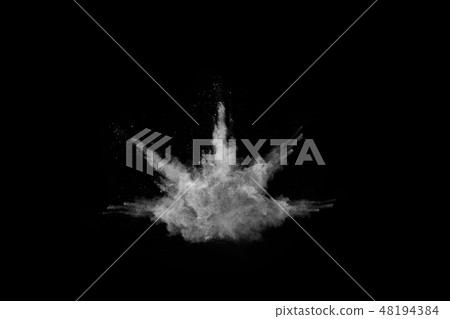 White powder explosion on black background. White powder explosion on black background. 48194384