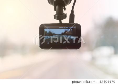 Using dashboard camera in the car 48194579