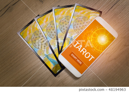 Tarot cards and mobile phone 48194963