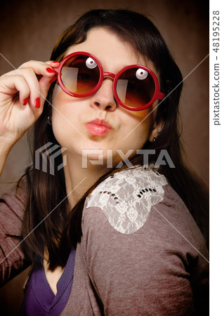 Funny young brunette woman Funny young brunette woman 48195228