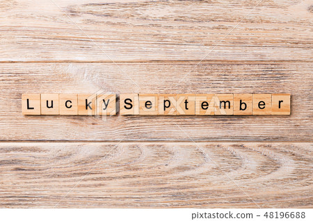 lucky september word written on wood block. 48196688