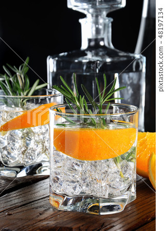 Classic Dry Gin with tonic and orange zest Classic Dry Gin with tonic and orange zest 48197134