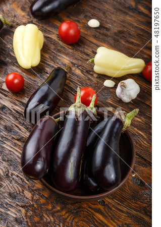 Vegetables on vintage wood background Vegetables on vintage wood background 48197650