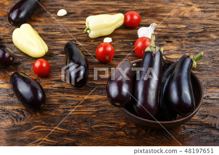 Vegetables on vintage wood background Vegetables on vintage wood background 48197651