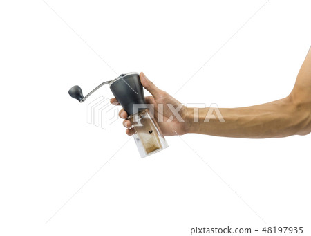 A man hand holding hand ceramic coffee grinder. A man hand holding hand ceramic coffee grinder. 48197935