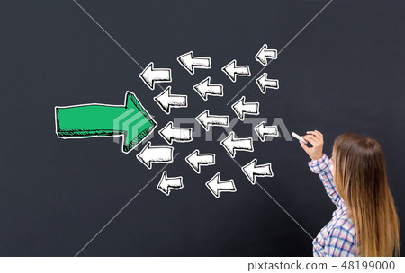 Arrow facing in a opposite direction with young woman Arrow facing in a opposite direction with young woman 48199000