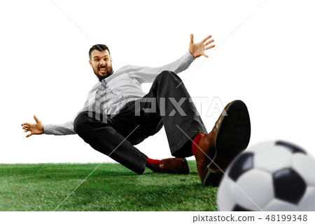 Full length shot of a young businessman playing football isolated on white background 48199348