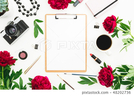 Workplace with clipboard, diary, red peony flowers 48202736