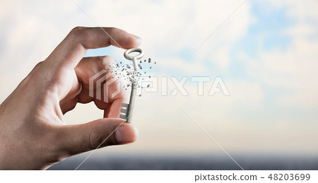 Key between fingers 48203699