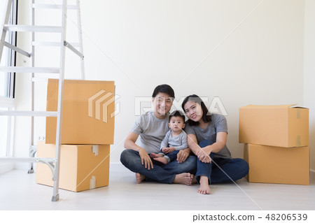Mother father and son in a new home Mother father and son in a new home 48206539
