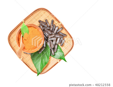 Natural medicine capsule pill with black herb. Natural medicine capsule pill with black herb. 48212338