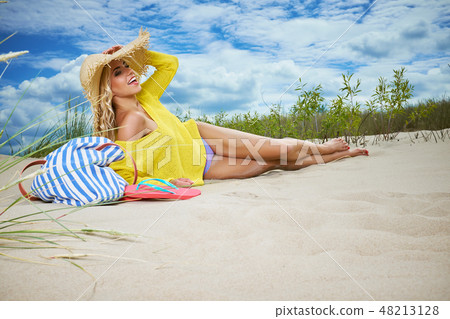 Beach woman funky happy and colorful wearing Beach woman funky happy and colorful wearing 48213128