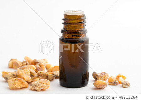 A bottle of styrax benzoin essential oil 48213264
