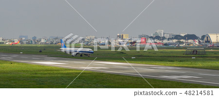 Passenger airplane taxiing on runway Passenger airplane taxiing on runway 48214581
