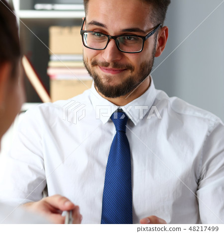 Handsome bearded man offer contract form on clipboard 48217499