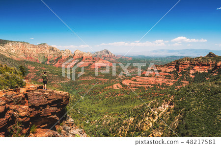 Hiker at the Schnebly Hill Vista Overlook Hiker at the Schnebly Hill Vista Overlook 48217581