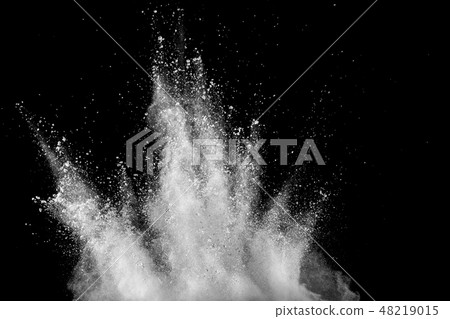 White powder explosion cloud on black background. 48219015