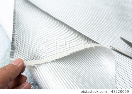 White carbon fiber composite material close up White carbon fiber composite material close up 48220069