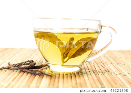 Green tea in a cup Green tea in a cup 48221298