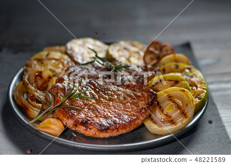 ready meal with meat and vegetables sprinkled 48221589