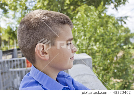 Cute brunette boy eleven years old 48223462