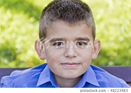 Cute brunette boy eleven years old Cute brunette boy eleven years old 48223463