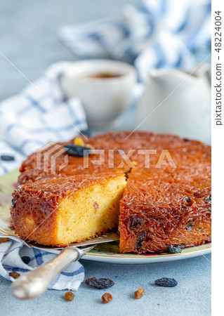 Dish with traditional dessert of baked noodles. 48224004