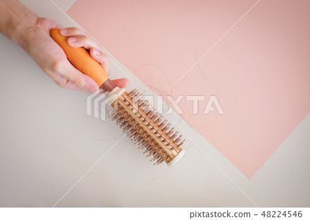 hair fall and lost alopecia woman problem  48224546