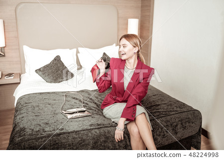 Slim businesswoman feeling excited coming for business trip 48224998