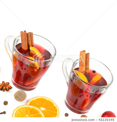 Hot red mulled wine isolated on white background Hot red mulled wine isolated on white background 48226349