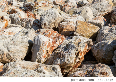 Background of large yellow red stones Background of large yellow red stones 48227246