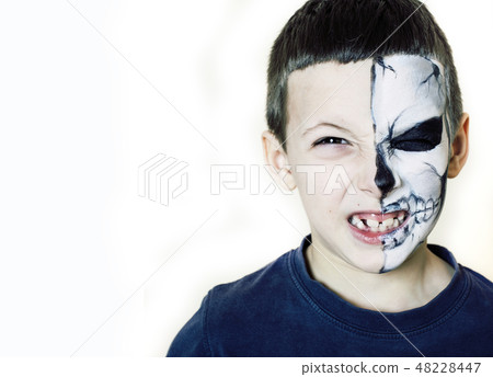 little cute boy with facepaint like skeleton to celebrate halloween, lifestyle people concept little cute boy with facepaint like skeleton to celebrate halloween, lifestyle people concept 48228447