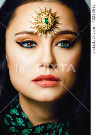 beauty eastern real muslim woman with jewelry close up, bride with star creative makeup beauty eastern real muslim woman with jewelry close up, bride with star creative makeup 48228618