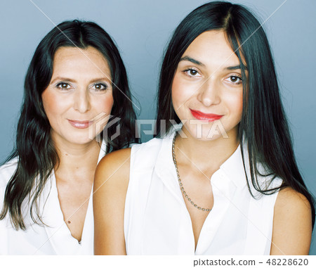 cute pretty teen daughter with mature mother hugging, fashion style brunette, lifestyle people cute pretty teen daughter with mature mother hugging, fashion style brunette, lifestyle people 48228620