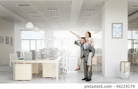 Business people having break in office Business people having break in office 48229179