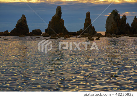 Dawn's pier rocks Dawn's pier rocks 48230922