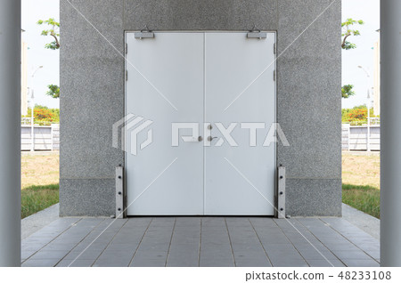 sidewalk by street wall & door sidewalk by street wall & door 48233108
