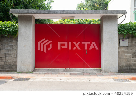 sidewalk by street wall & door sidewalk by street wall & door 48234199
