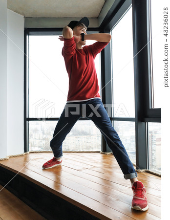 Teen boy dancing Teen boy dancing 48236028