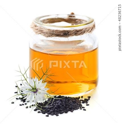 Black cumin oil with flower Black cumin oil with flower 48236715