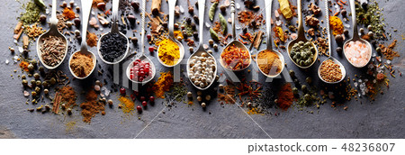 Herbs and spices on black board Herbs and spices on black board 48236807