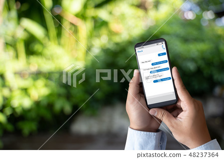man touch on button instant messaging app on  48237364