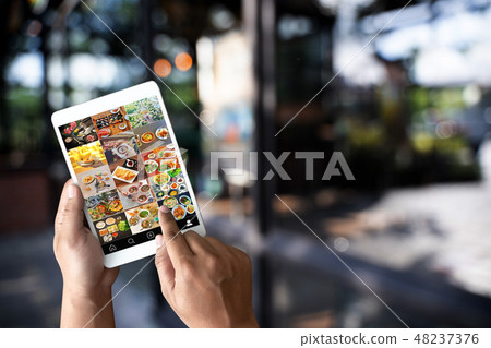 man looking phone publicly shared photo on social man looking phone publicly shared photo on social 48237376