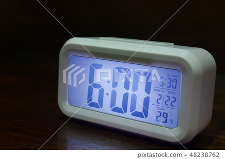 The digital alarm clock 6:00 close up image. The digital alarm clock 6:00 close up image. 48238762