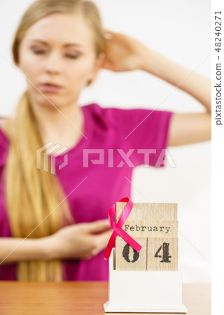 Woman and world breast cancer day on calendar 48240271