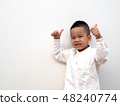very happy asian boy making thumbs up sign 48240774