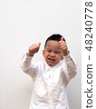 very happy asian boy making thumbs up sign 48240778