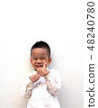 very happy asian boy making thumbs up sign 48240780